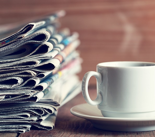 Newspaper stack coffee