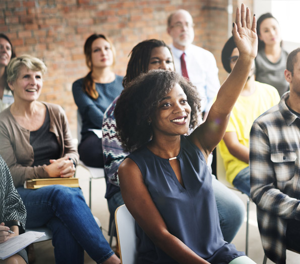 Hosting a Culture Workshop | Sterling Talent Solutions Group with hands up in front